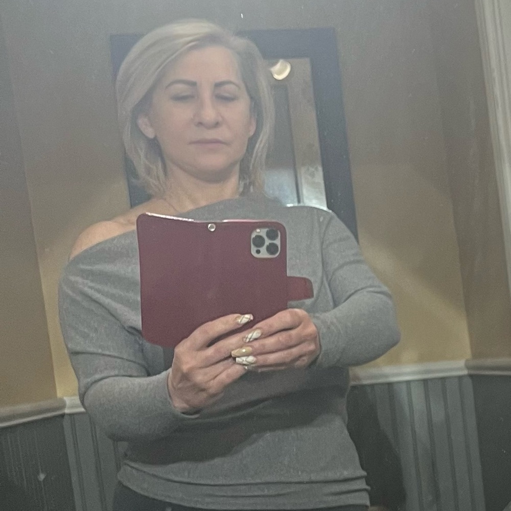 New Women’s or juniors off the shoulder, asymmetrical gray sweater, super soft.